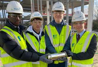 Pupils bury time capsule at new 'state-of-the-art' campus