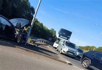 Delays after two cars crash near shopping centre