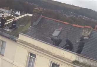 Dramatic moment drugs factory raiders caught by police on rooftops
