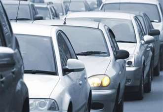 Long delays as abandoned vehicle blocks road