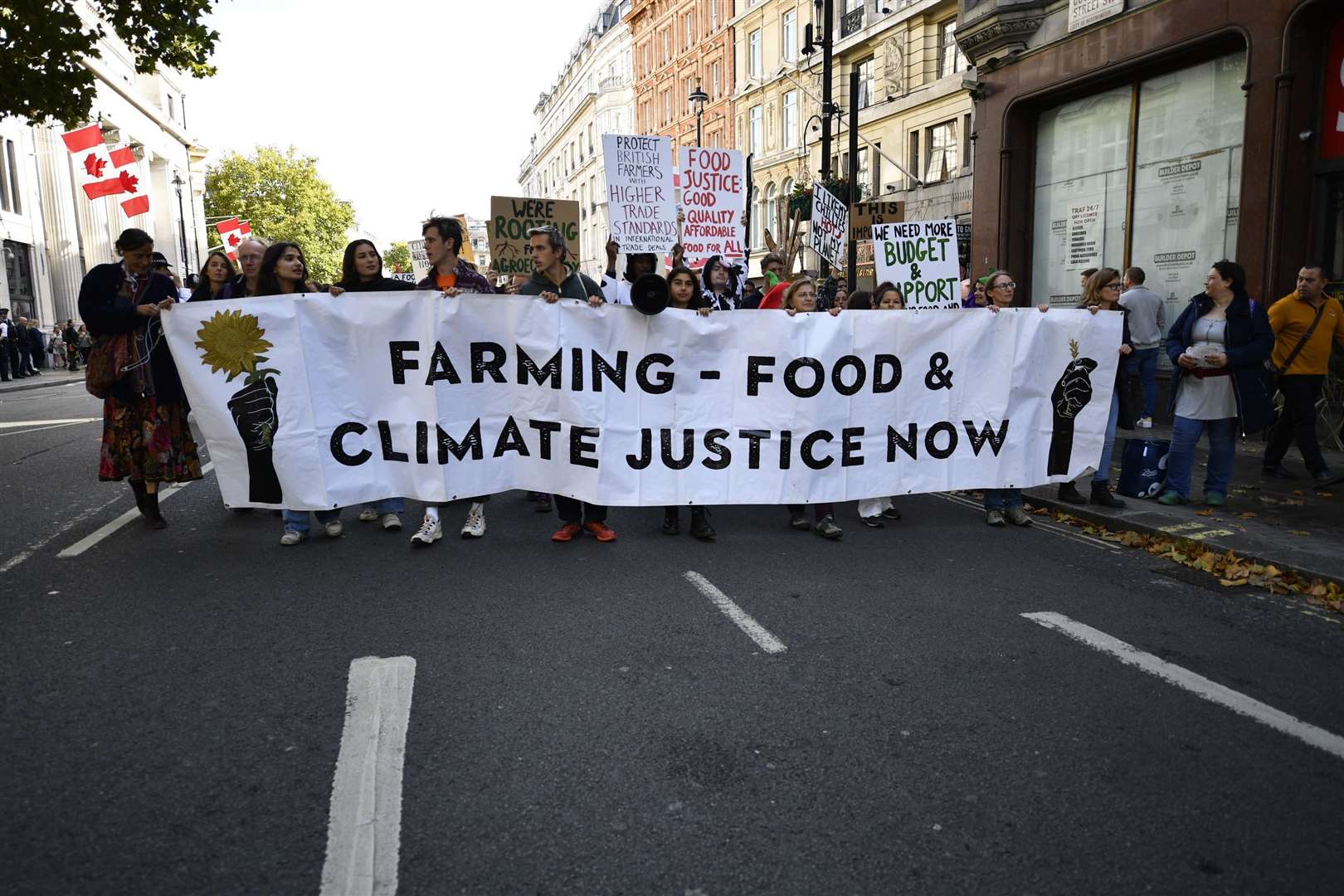 Farm workers and environmental activists march through central London