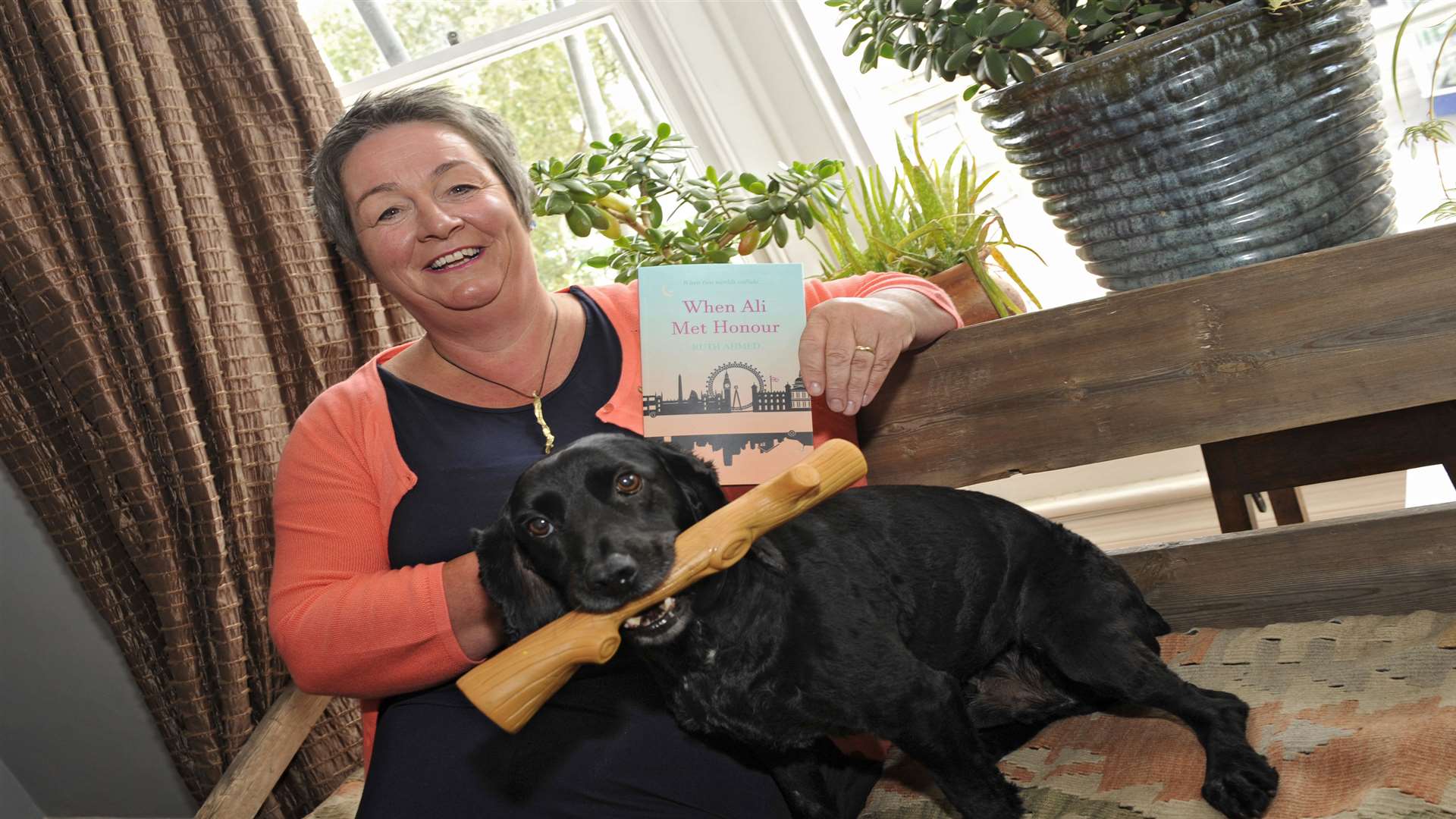 Victoria Road, Deal. Local author Anstey Spraggan with her dog Iggy