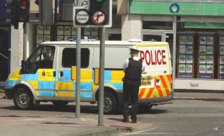 Lee Cowie is driven away in a police van after the hearing. Picture: ANDY PAYTON
