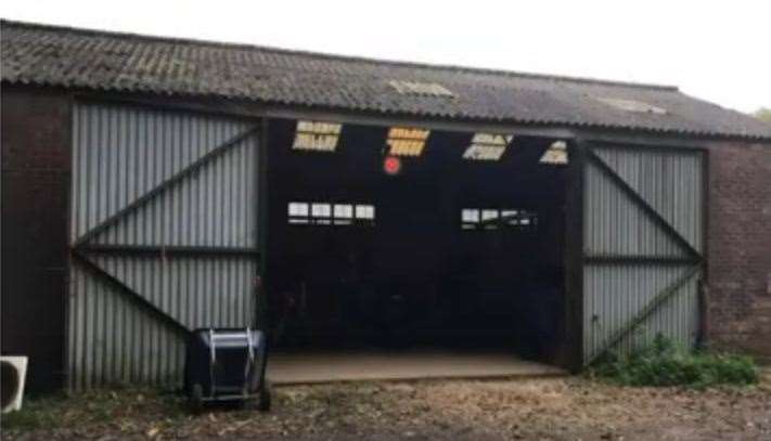 The existing barn would be converted into a reception, shower rooms and shop