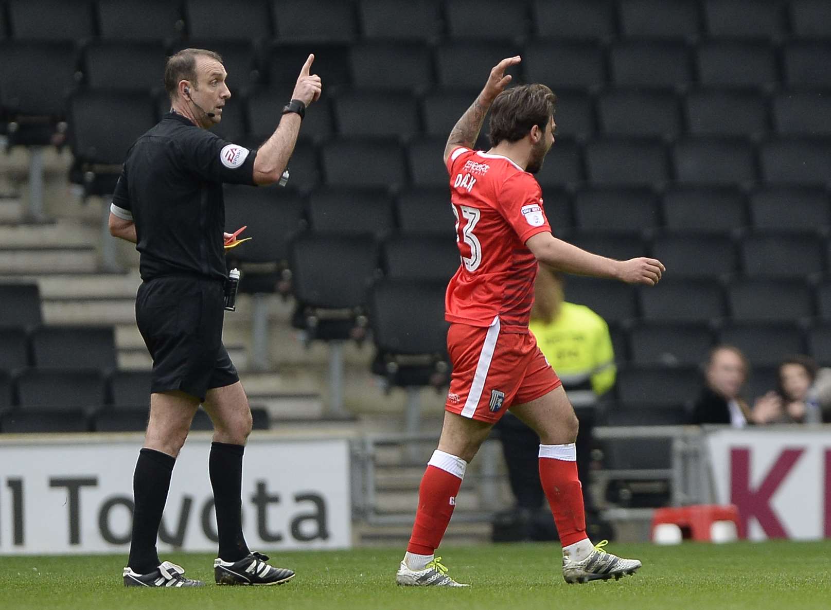 Bradley Dack is sent off following dissent to referee Carl Boyeson against MK Dons Picture: Ady Kerry