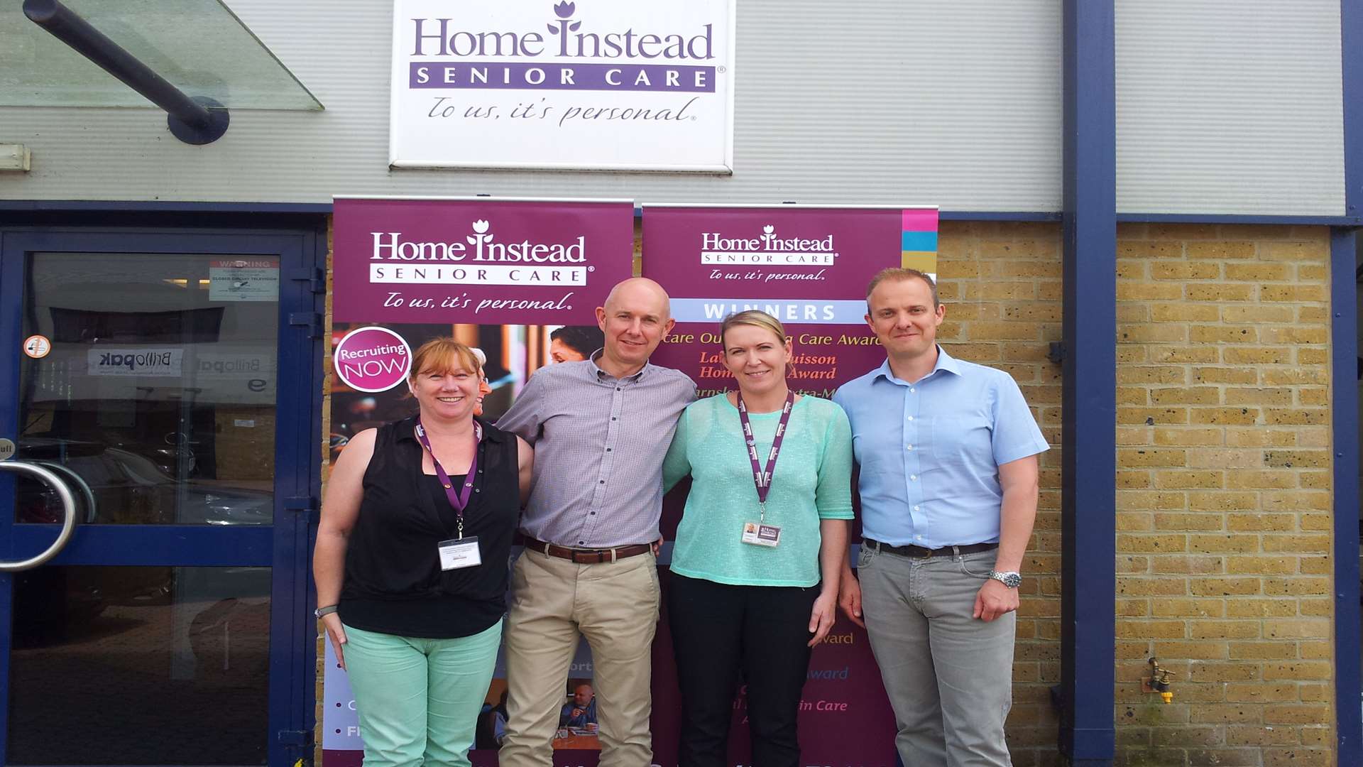 Jane Hillman, Andy Craig, the co-owner of Home Instead Senior Care, Lisa Newton and fellow co-owner Mark Craig.