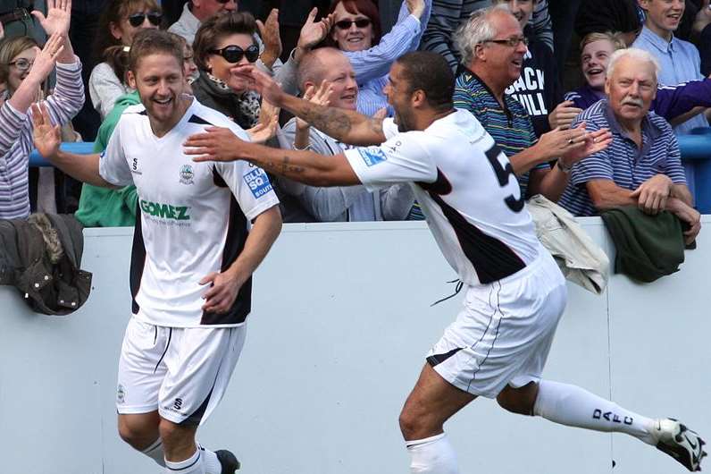 Ben May (left) celebrates scoring for Dover