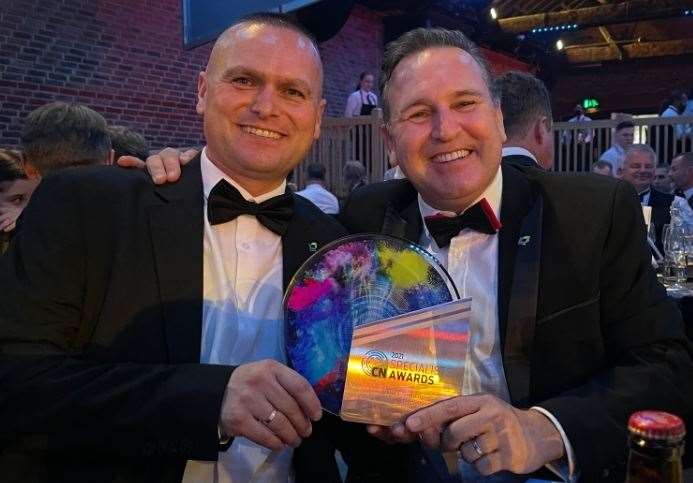 Lucas logisitics manager Pawl Trzopek and Danny Lucas with the award