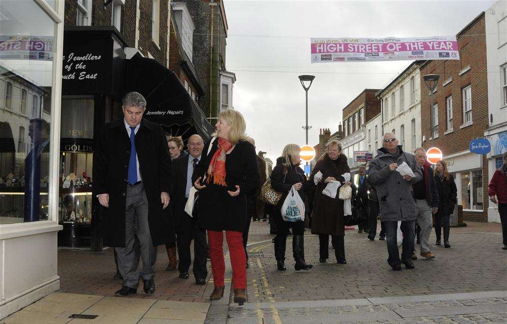 Esme Chilton of the Deal Town team with Brandon Lewis on a tour of the high street