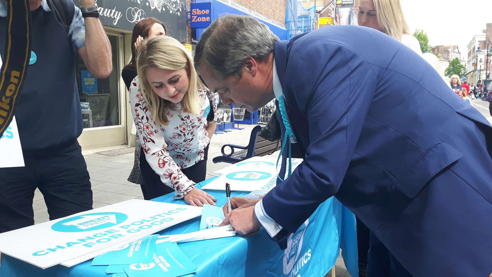 Nigel Farage signs an autograph - but remains at the cheaper end of the market