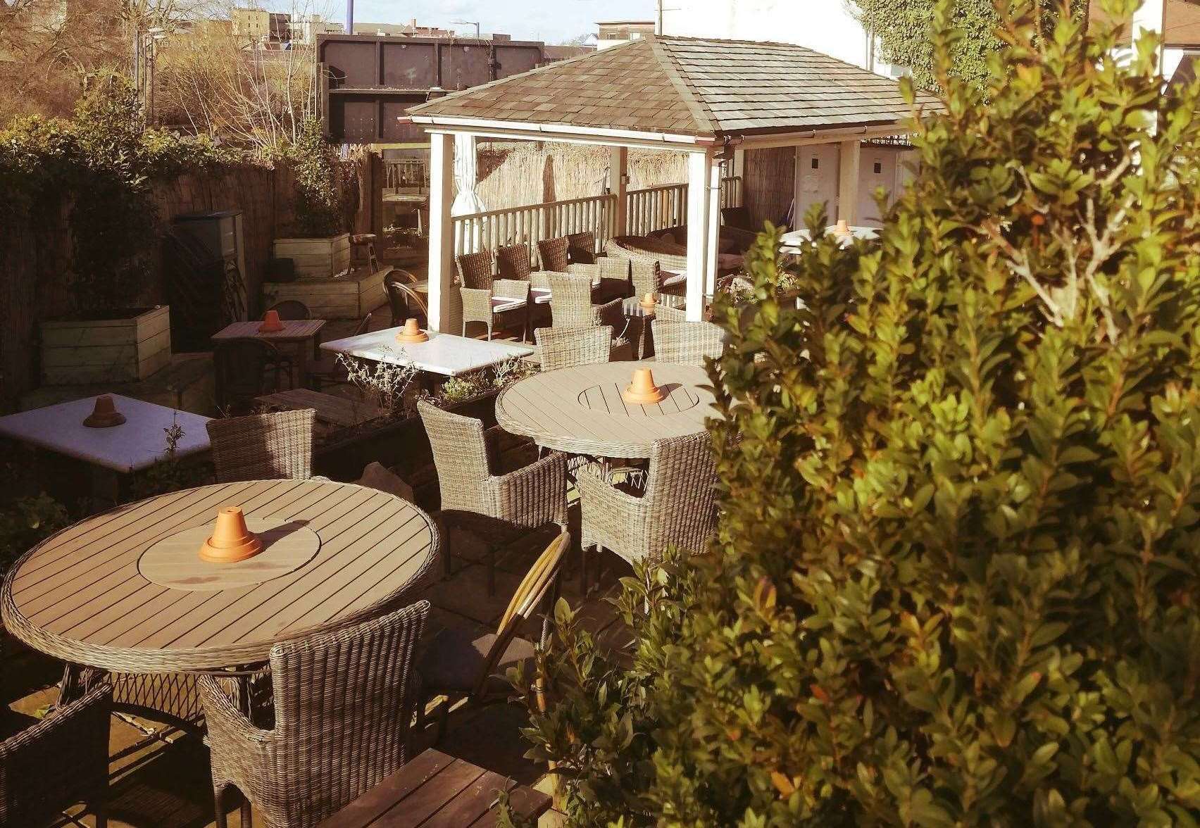 The Malt Shovel has lots of contemporary seating areas in its beer garden