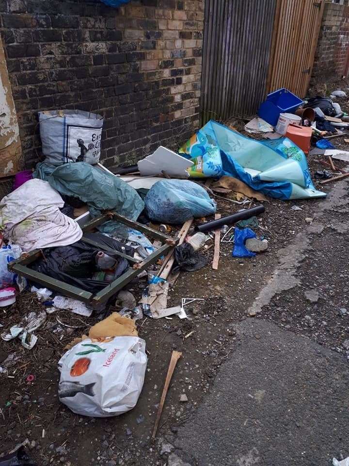 Fly tipping and waste strewn in alleyways between Elthelbert Road and Athelston Road in Margate (8433319)