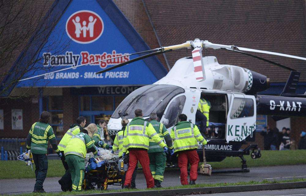 Paramedics take the crash victim to the air ambulance