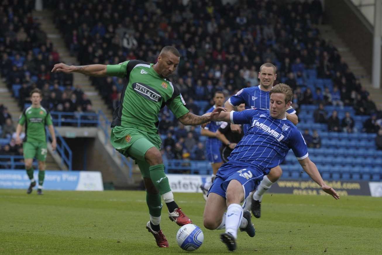New Dover signing Connor Essam (right) in action for Gillingham against Dagenham and Redbridge. Picture: Barry Goodwin