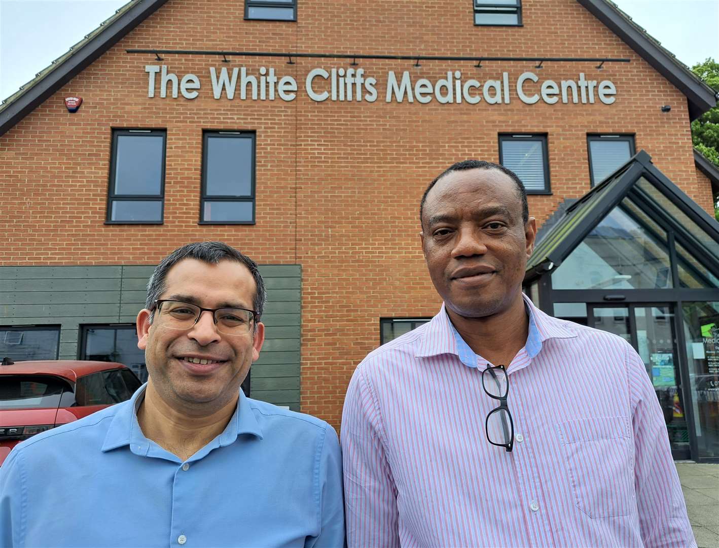 Two of the doctors at the White Cliffs Medical Centre in Folkestone Road, Pankaj Jain, left, an Abiola Idowu