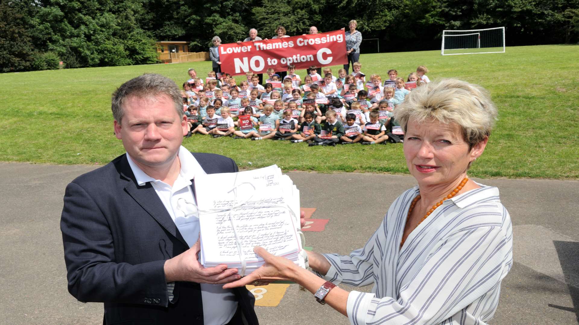 MP Adam Holloway accepts the petition from Clare Waller, school governor and Shorne Action Group member