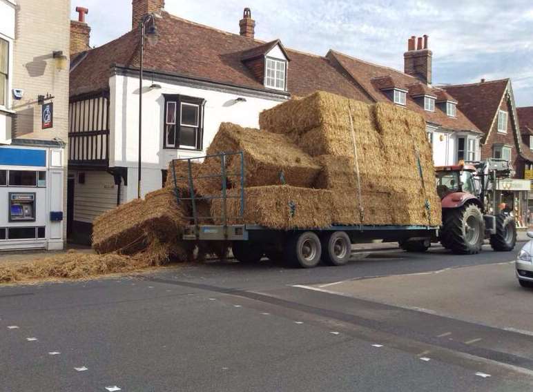 The tractor with its spilt load. Picture: Jack Wenbourne