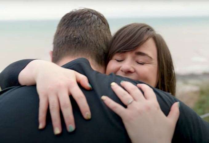 Jade and her partner embrace after winning their dream home in Kingsdown. Pic: Omaze