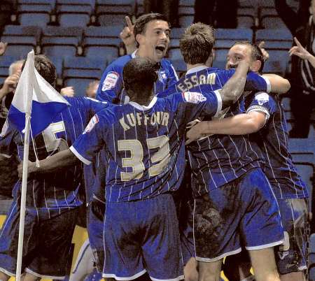 Gills players celebrate their final goal