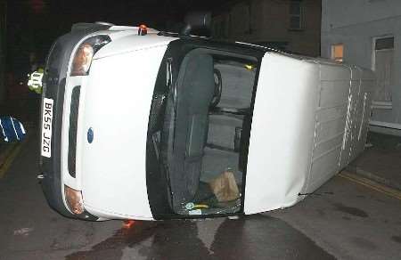 The overturned police minibus: Picture: WAYNE McCABE/ FERRARI PRESS AGENCY