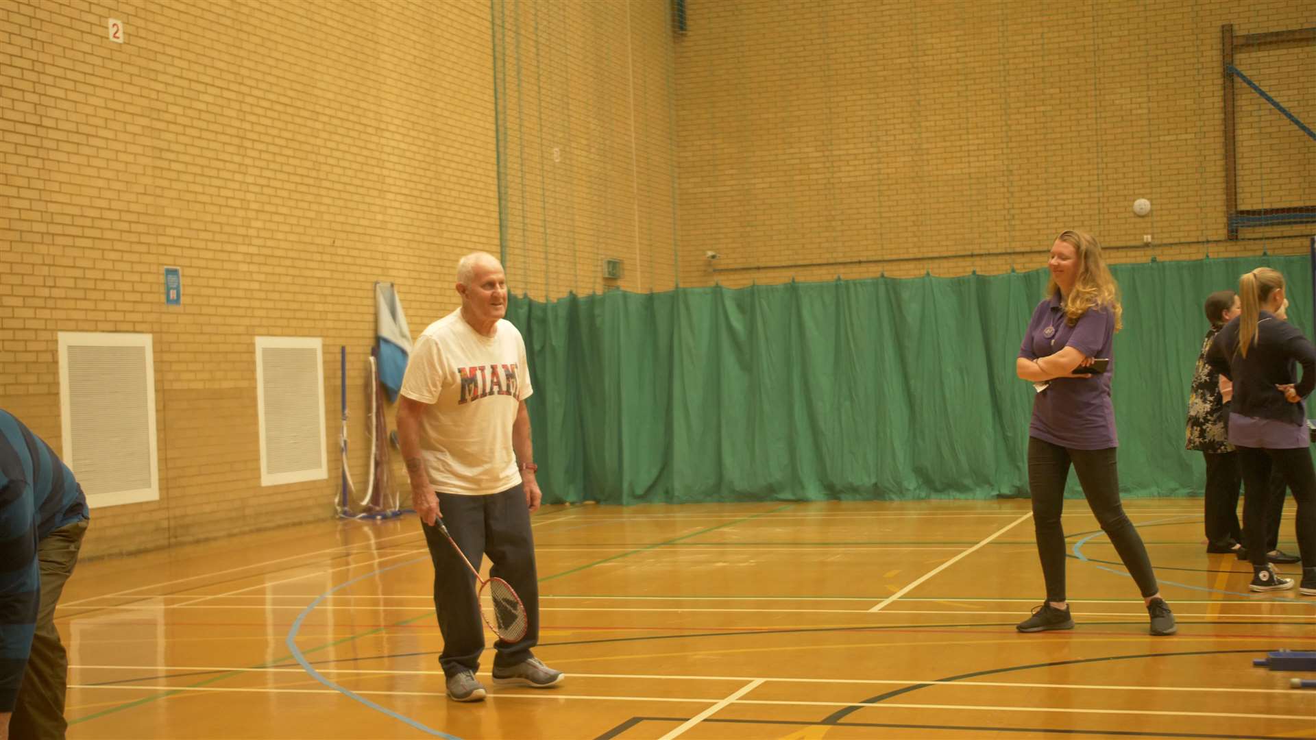 The group playing badminton