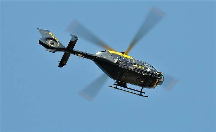 The police helicopter aided in the search. Stock Picture