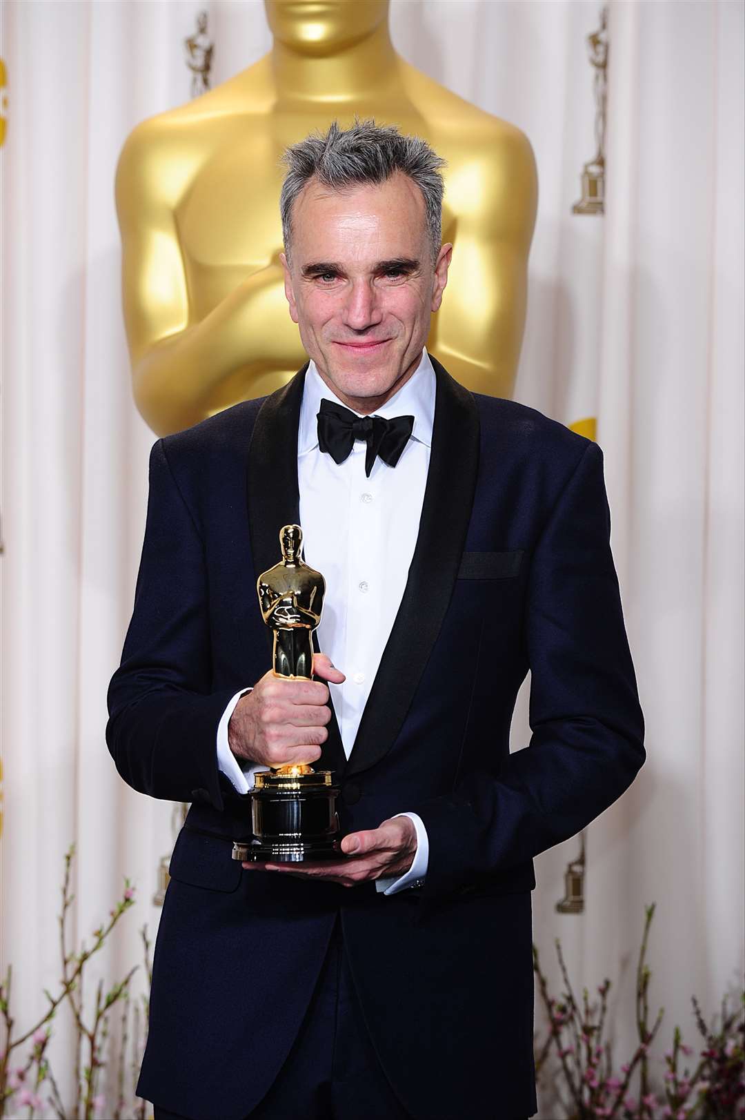 Daniel Day-Lewis with his Oscar for best actor received for his role in Lincoln (Ian West/PA)