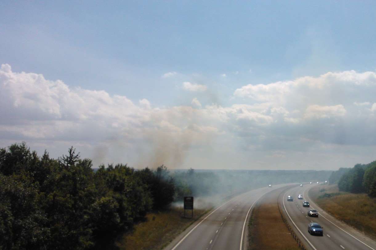 Smoke from the blaze drifts over the A249