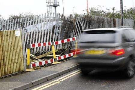 A car ploughed through a fence in Station Road, Strood