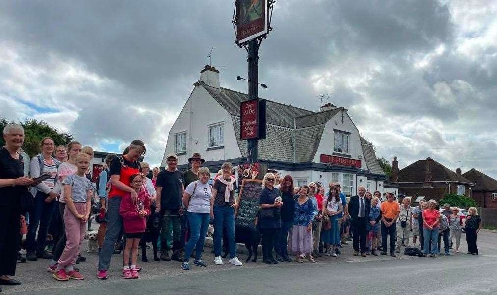 The walkers gathered outside the Redstart pub