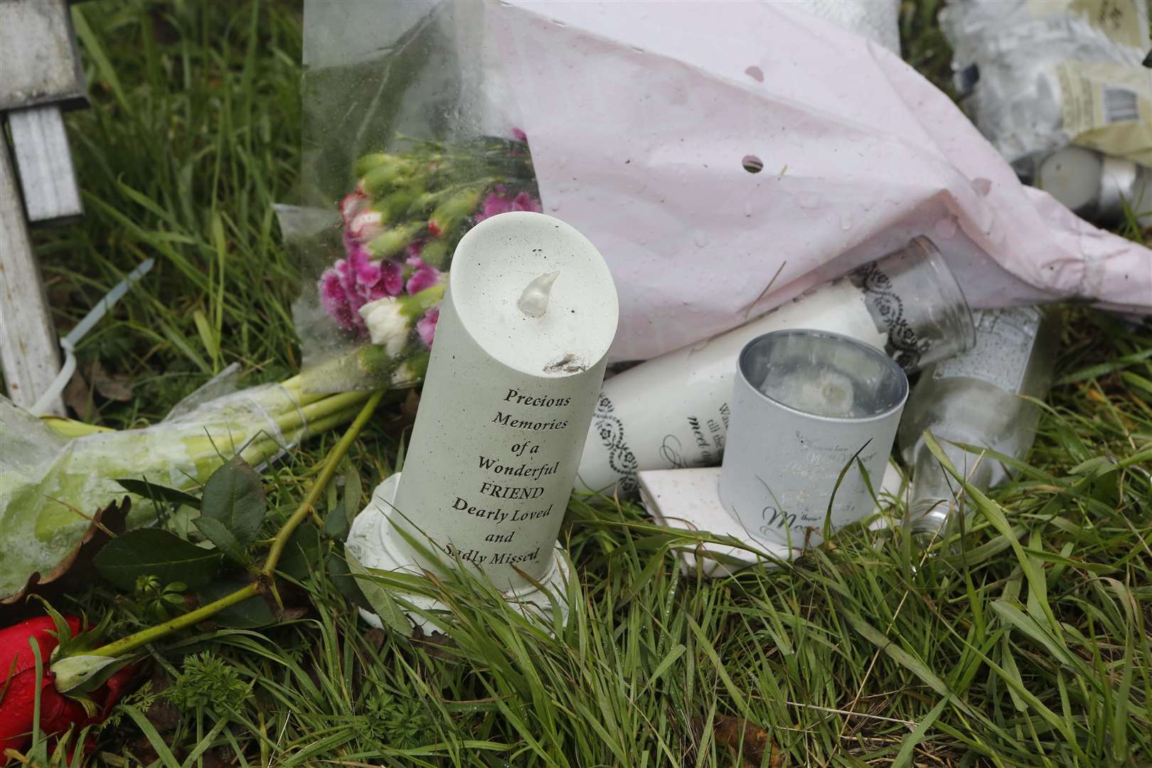 Candles, flowers and other tributes