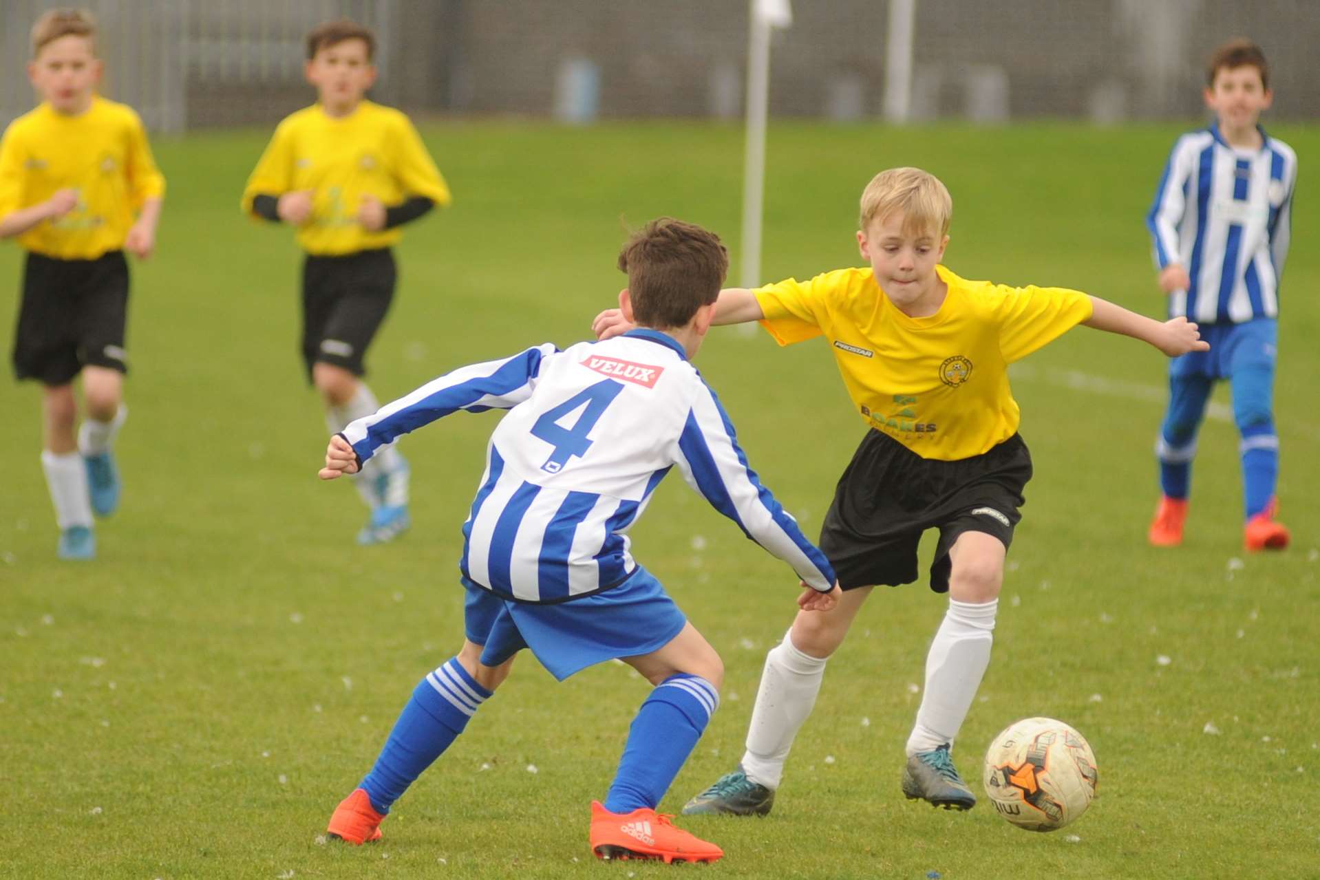 Bredhurst Juniors under-11s (yellow) take on Chatham Riverside Picture: Steve Crispe