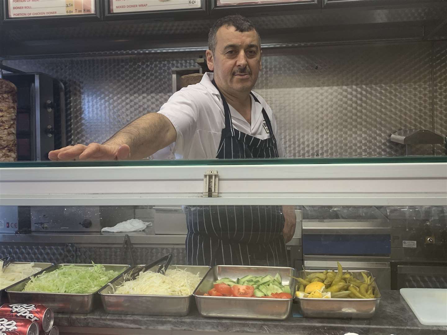 Mehmet Dogan runs BBQ Grill with the help of family.
