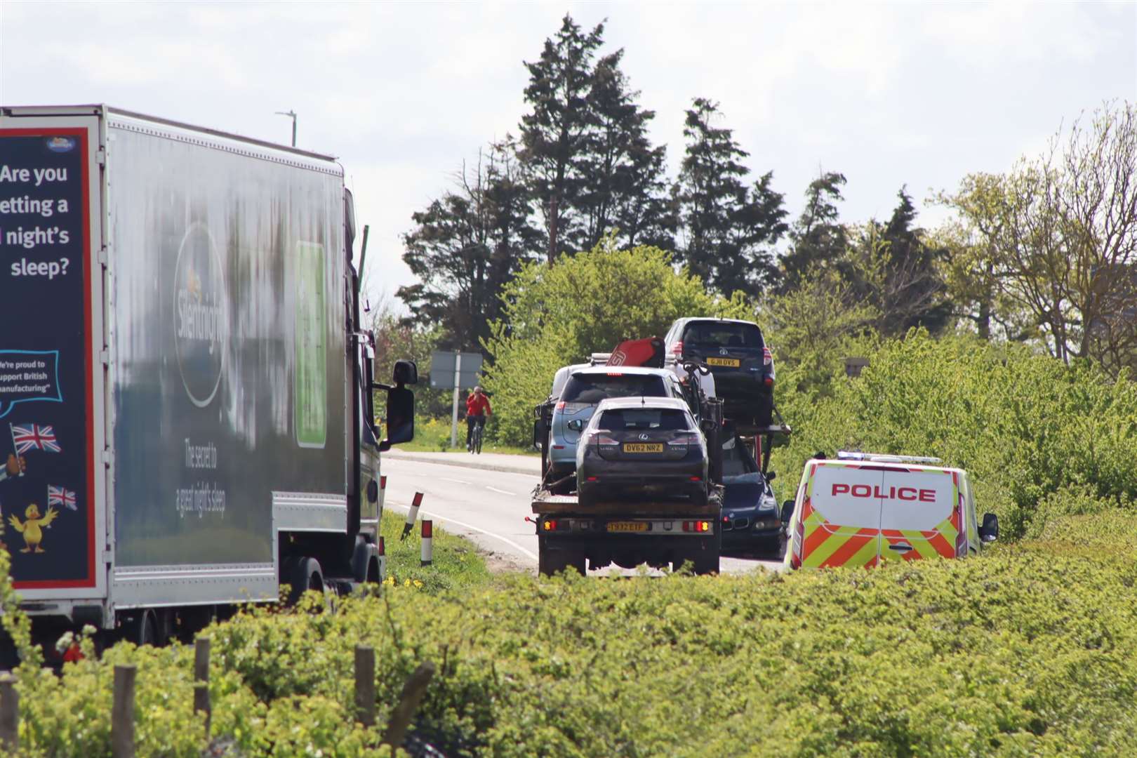 Traffic waiting as four cars are taken away after a crash on the Lower Road, Minster, Sheppey