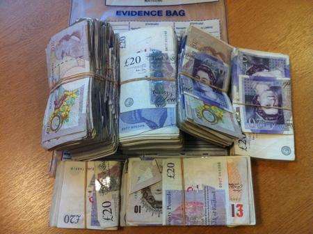 Bundles of cash were discovered by detectives