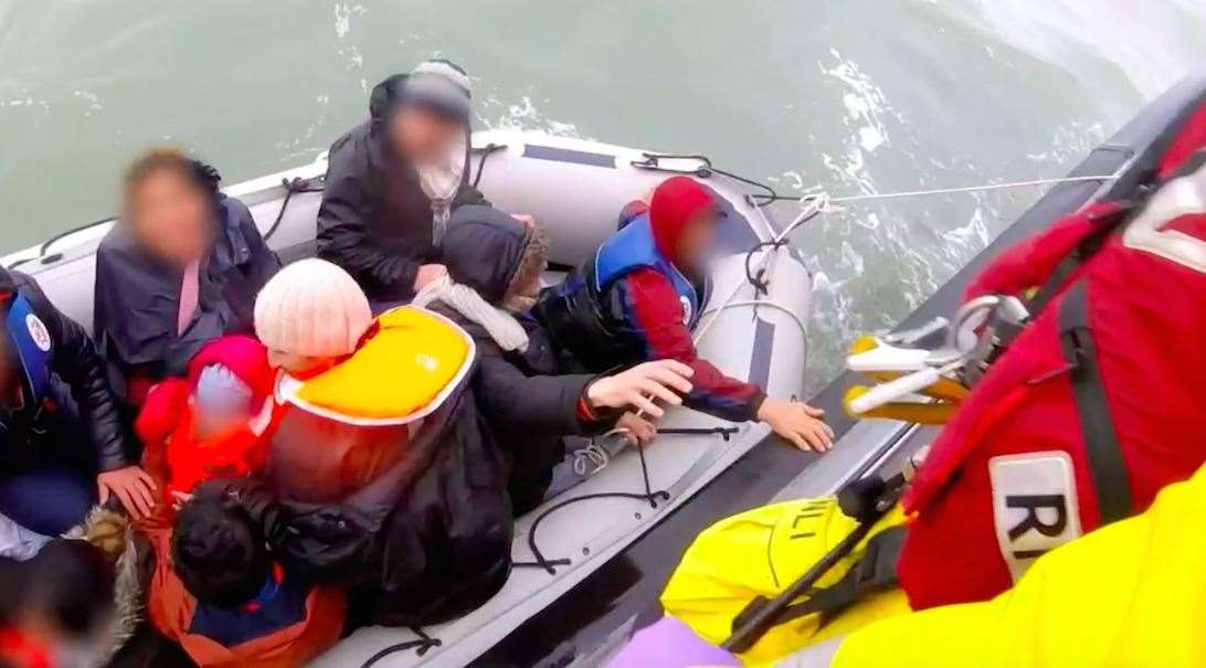 RNLI crews rescue a group from a dinghy Picture: RNLI