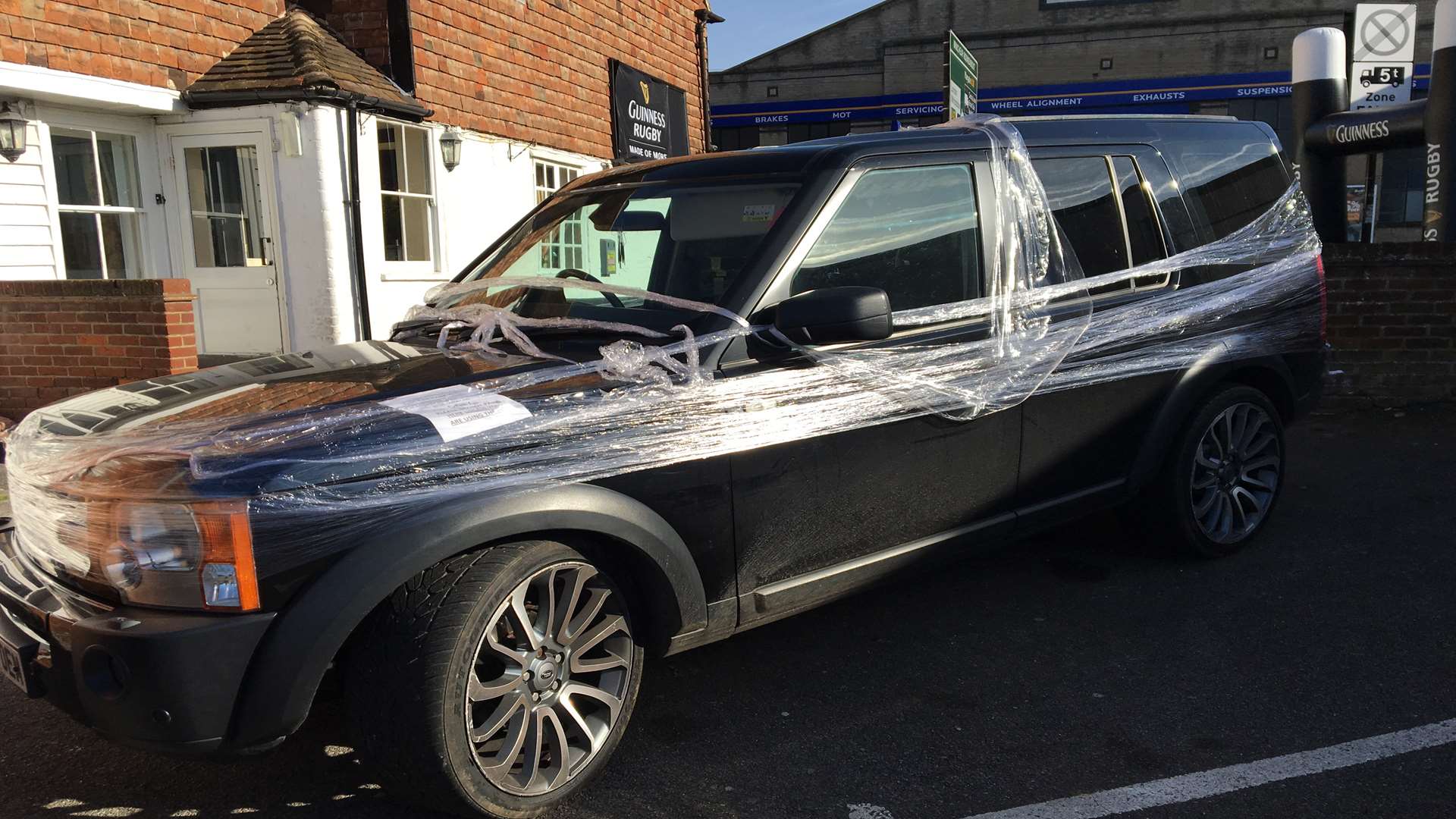The cling filmed car was apparently a practical joke between bar staff and customers