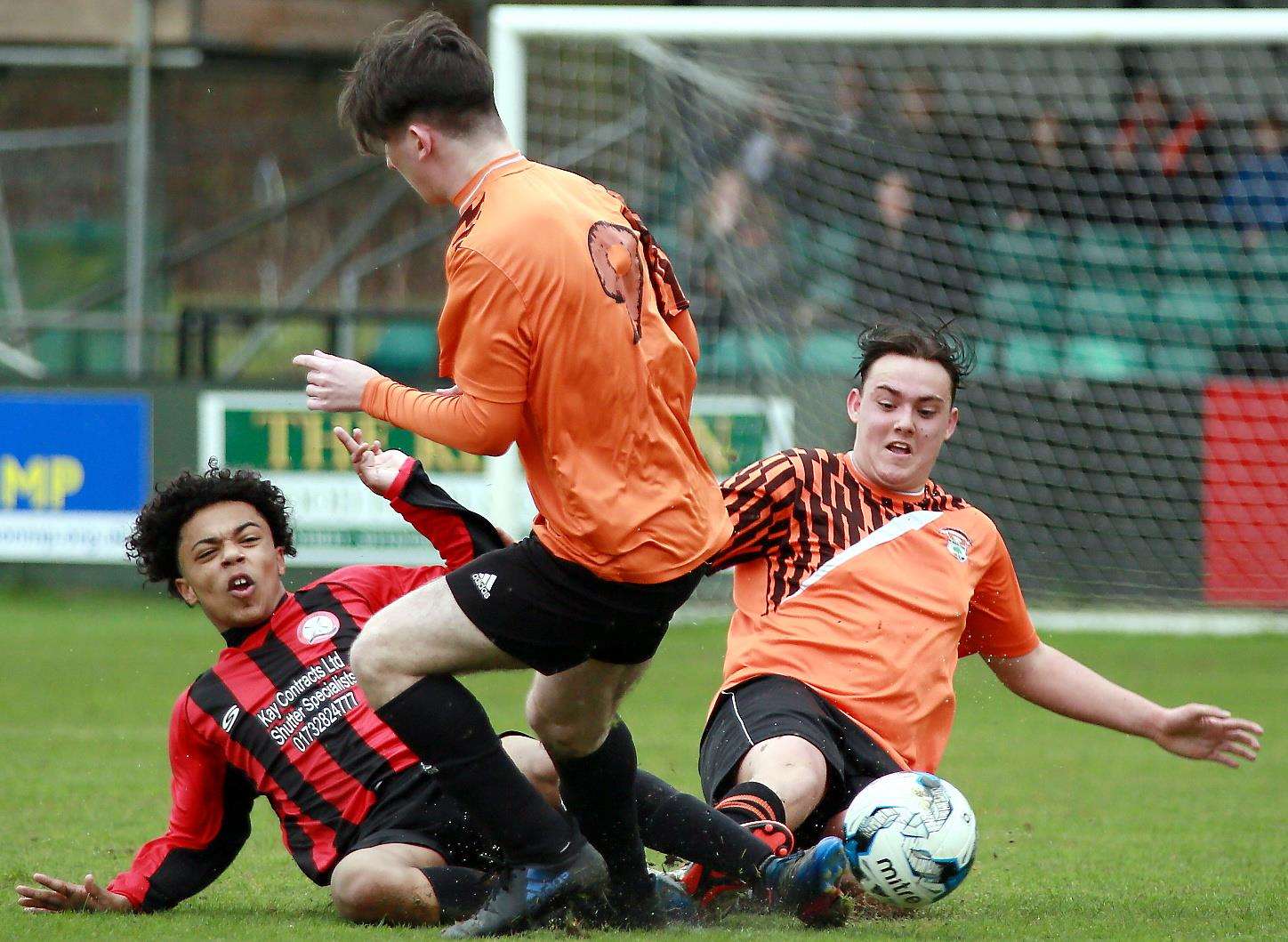 Meopham Colts Black under-18s (black/red) compete for the ball against Lordswood Youth under-18s. Picture: Phil Lee FM1415919