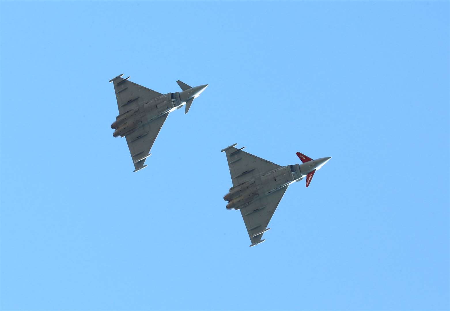 A flypast by RAF Typhoons at the funeral of Cpl Jonathan Bayliss. Picture: SWNS