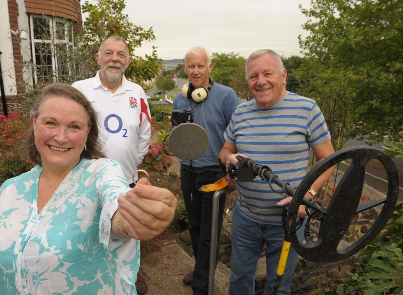 Jane Etheridge with her wedding ring, and (from left to right) Gary Etheridge, Darren Branstone and Mick Rolfe. Picture: Steve Crispe