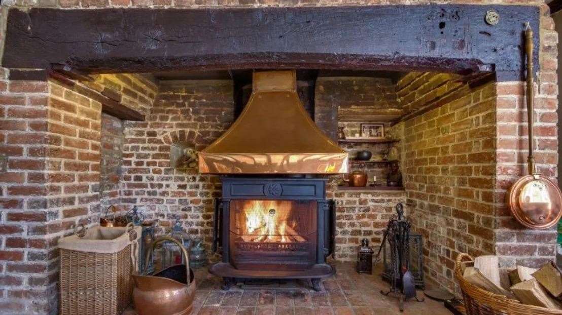 The £1.85m house in Aldington has a fire to cosy up to. Picture: Graham John agents