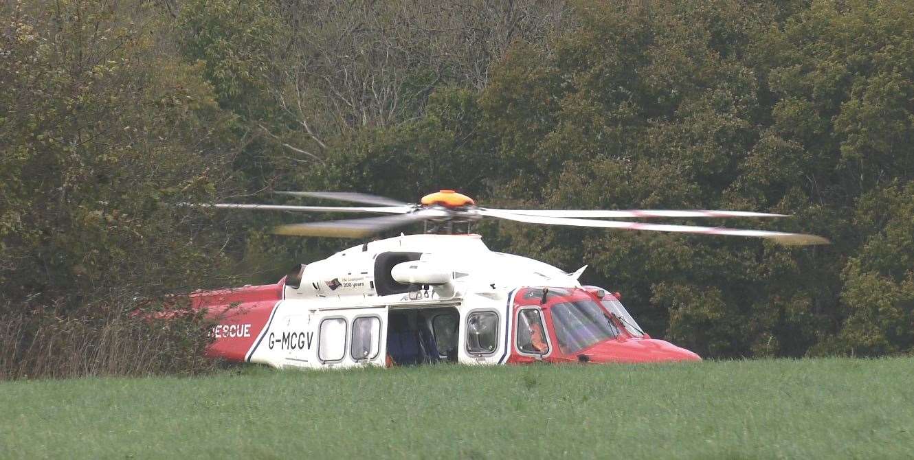 The rescue helicopter near the Robin Hood pub in Blue Bell Hill. Pictures: UKNIP