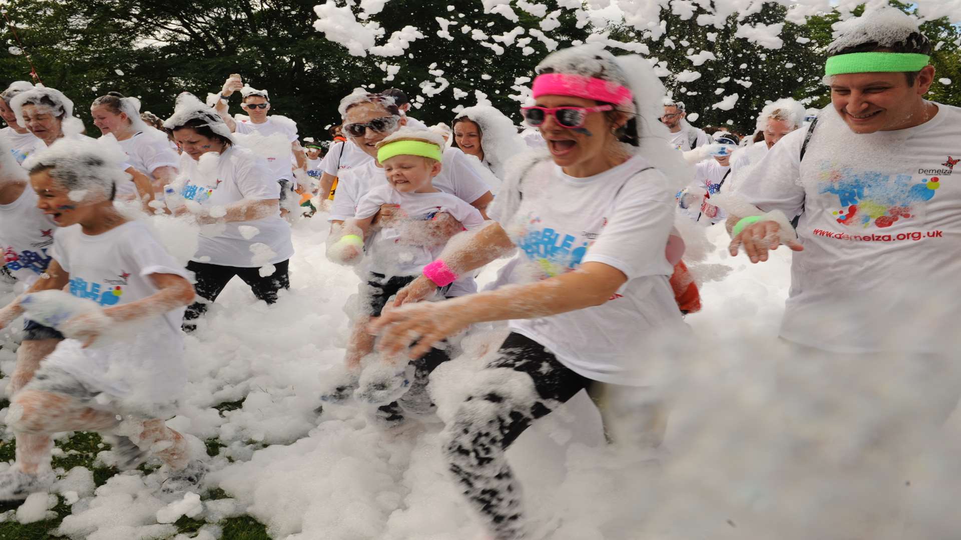 The group of fundraisers ran there way through towers of foam for Demelza.