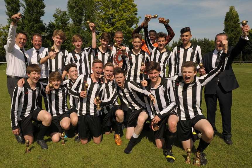 Real 60 toast their under-16 John Leeds Trophy final win over Omega 92 Picture: Steve Crispe