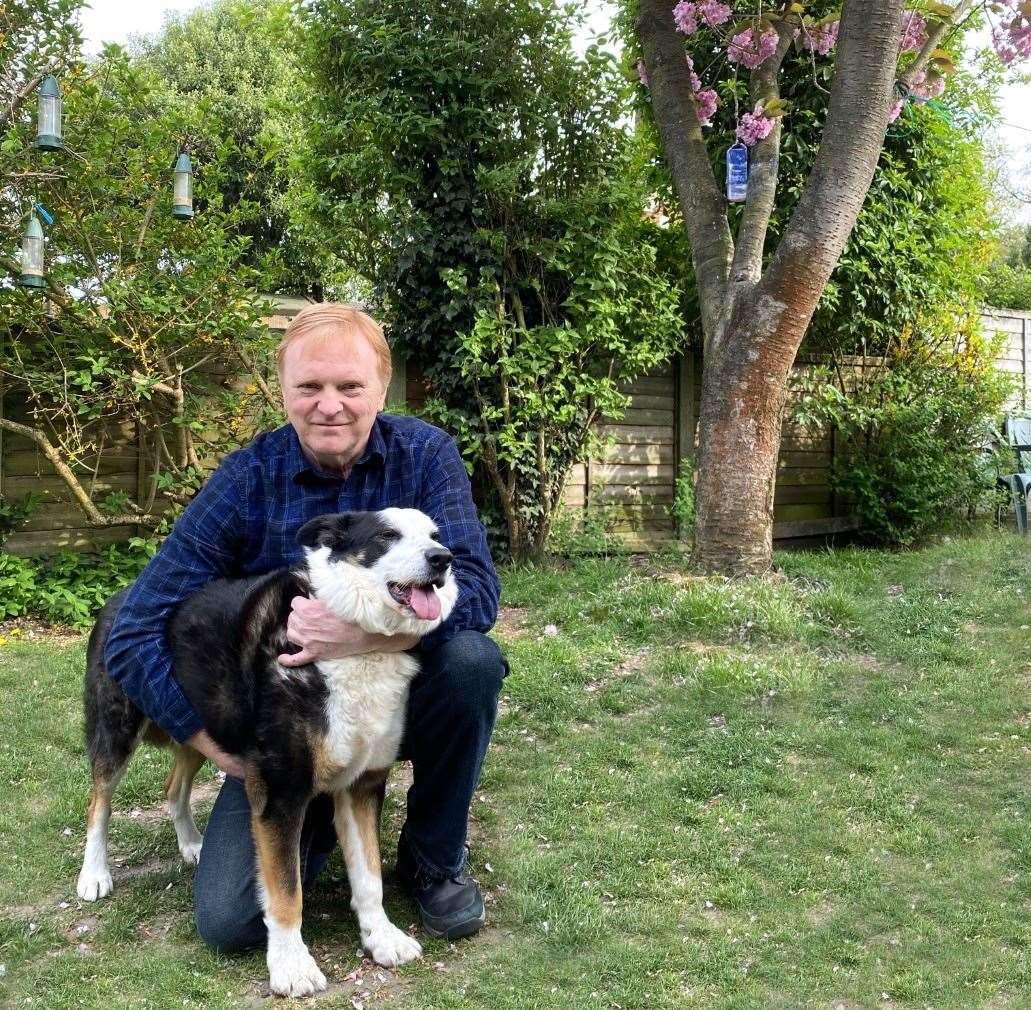 Michael with dog Patch following his recovery
