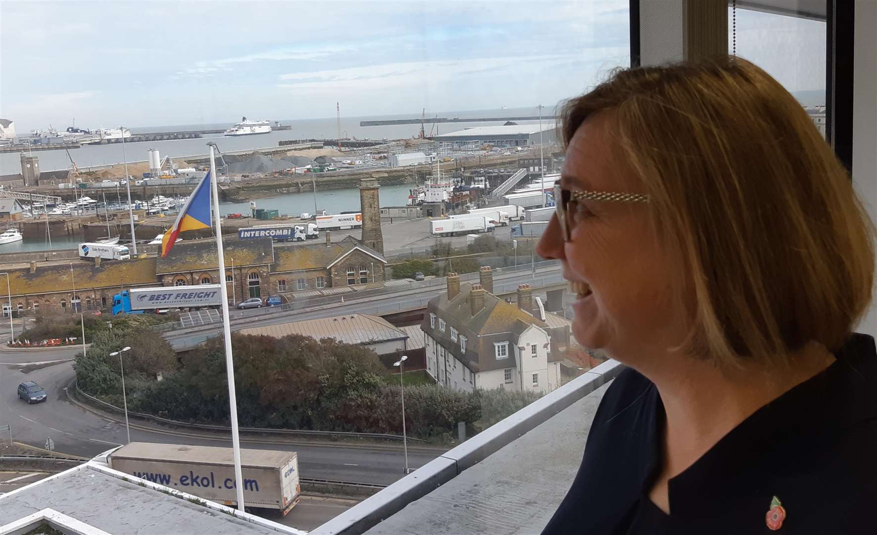 Corporate vision. CEO Janette Bell views the bustling harbour with P&O vessels from her boardroom