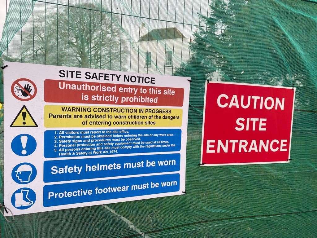 A sign warns of construction work at the home