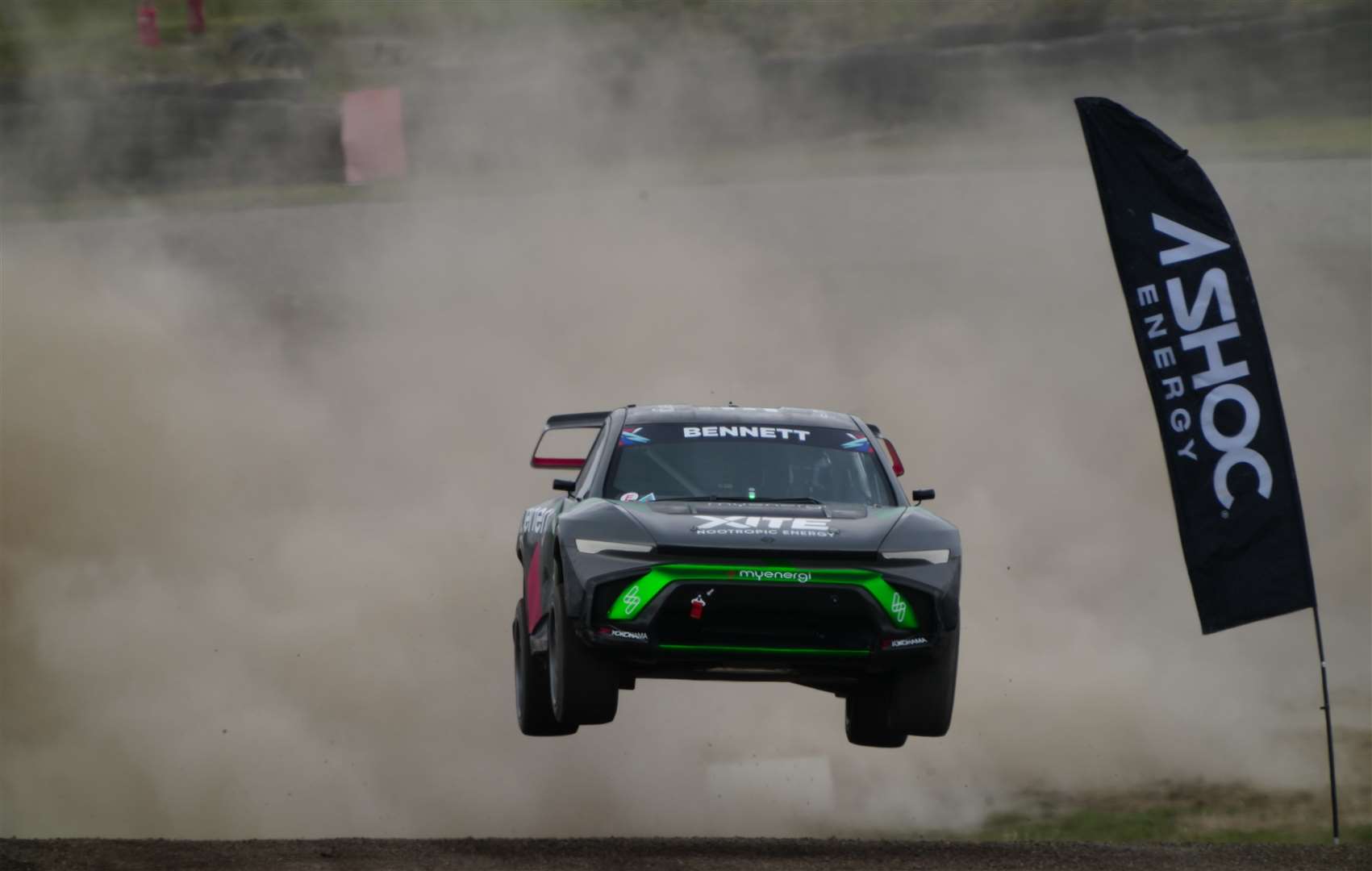 Oliver Bennett catches some air over the jump. The Xite Energy Racing driver will be joined at the next round in Sweden by team-mate Jenson Button, who was unable to race at Lydden due to a clashing commitment with Sky Sports F1 at the Canadian GP. Picture: Nitro Rallycross
