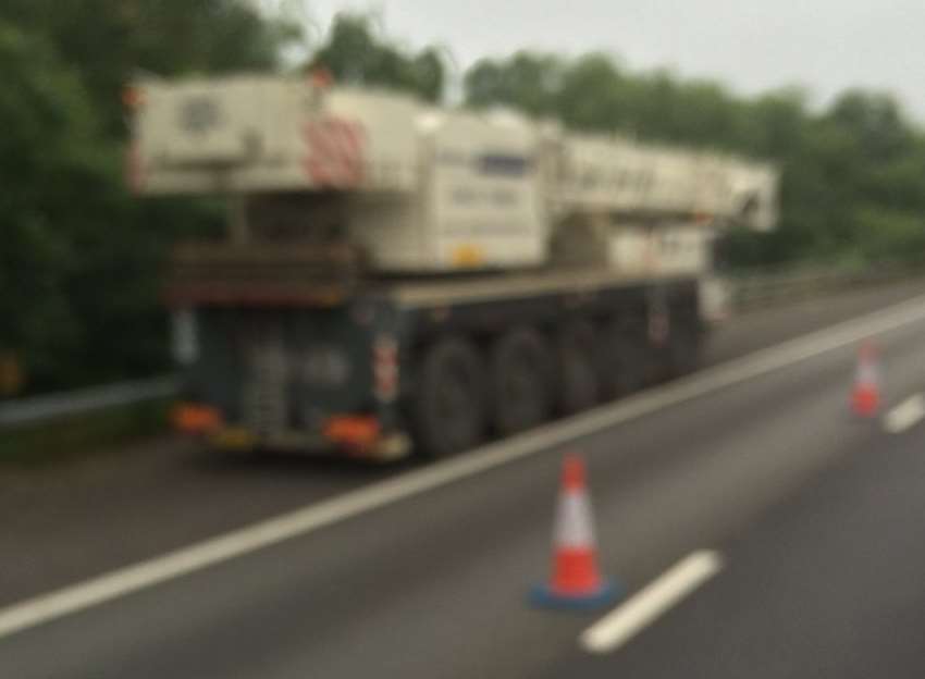 The crane is causing tailbacks on the M26. Picture: Paul Oliver