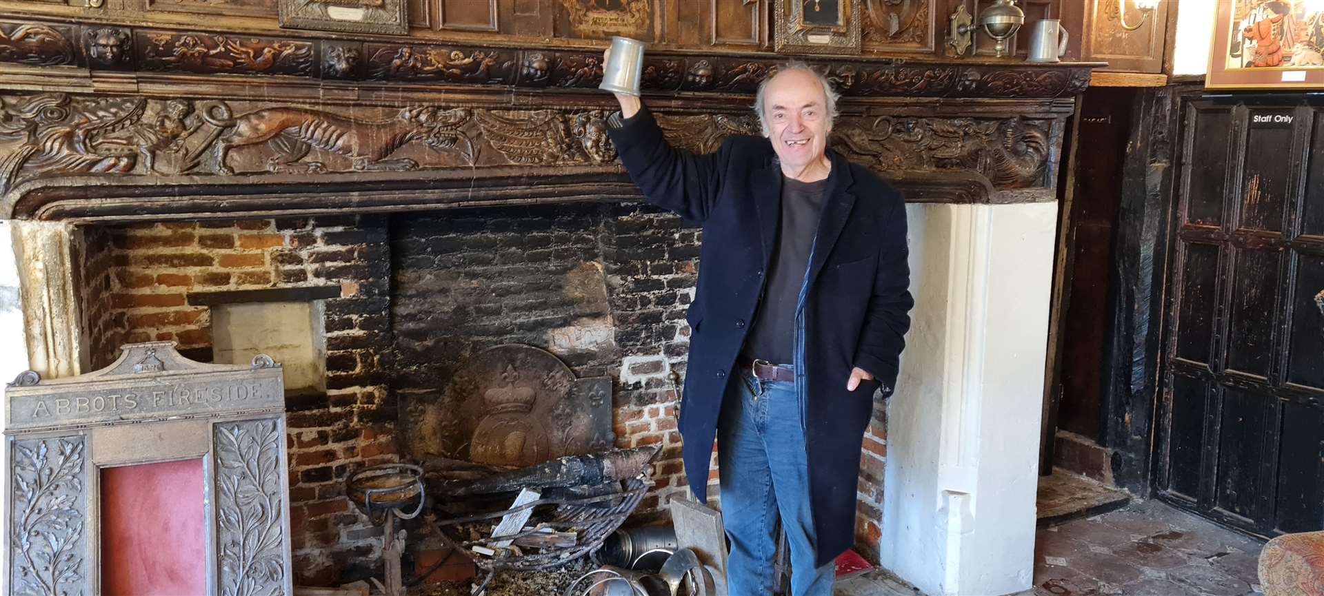 Peter Malkin has removed the wood burner to bring back the original inglenook fireplace